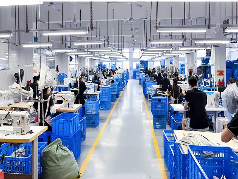 ACEWARM production workshop, garment assembly line
