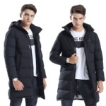 Smart heated long parka coat in black worn by male model